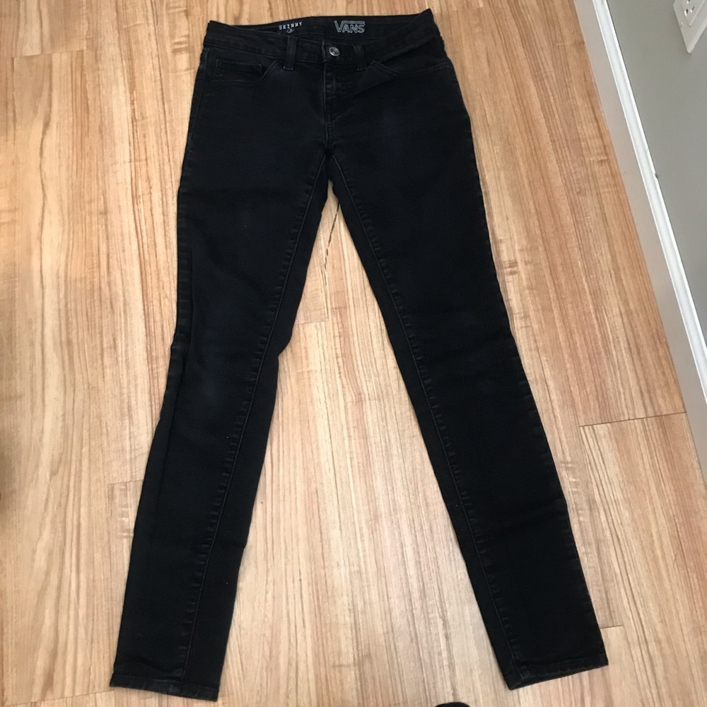 Black Vans skinny jeans.